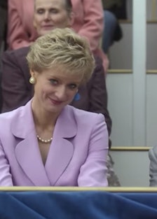 A still from the Netflix show The Crown, depicting Princess Diana in a lavender colored suit