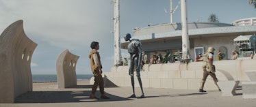 Cassian talking with a security droid on Niamos