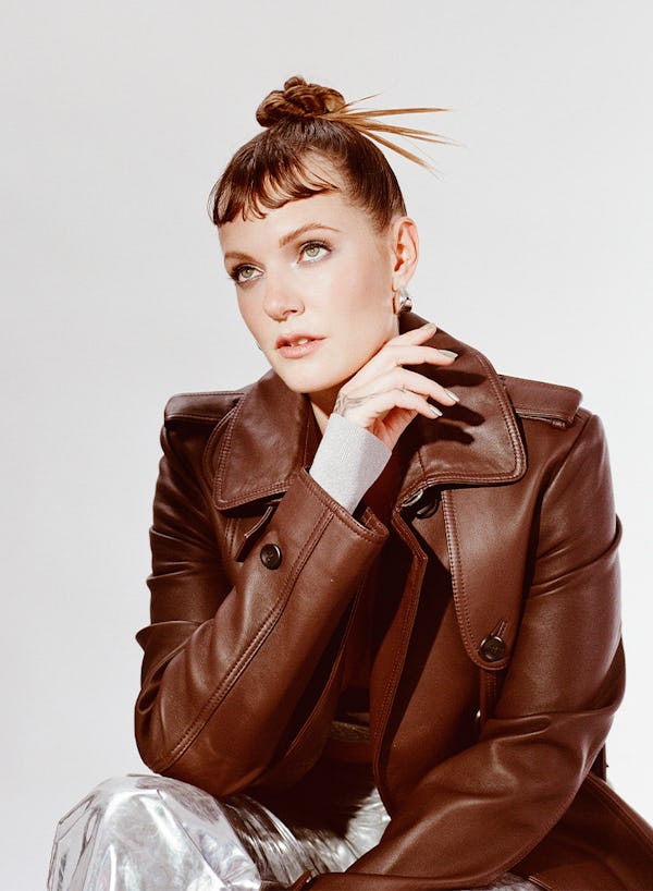 Tove Lo wearing a brown jacket while looking in the distance
