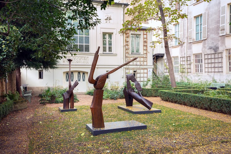 Abstract sculptures made of wood in a Parisian courtyard