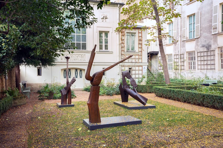 Abstract sculptures made of wood in a Parisian courtyard