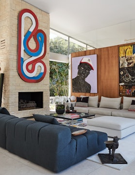 In the living room of Corinne and Laurent Opman’s guest pavilion, sofas from B&B Italia and Camerich...