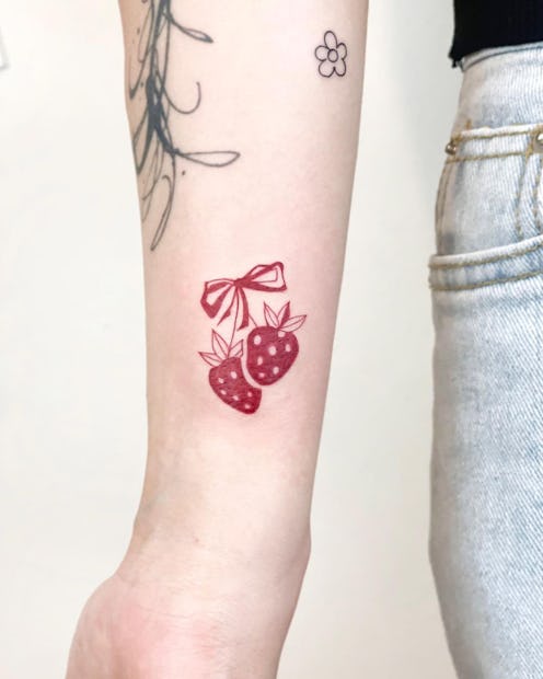 Irresistibly cute strawberry tattoo designs.