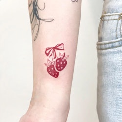 Irresistibly cute strawberry tattoo designs.