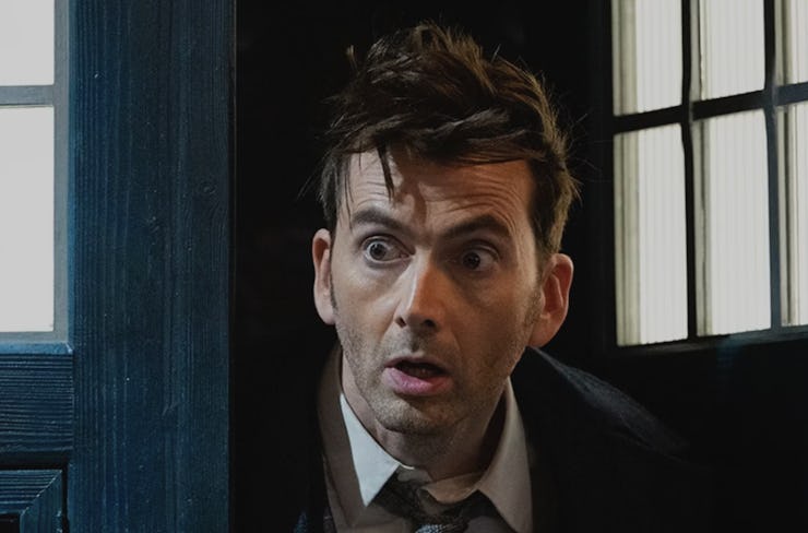 David Tennant as Doctor Who, peaking out of a door with a shocked facial expression
