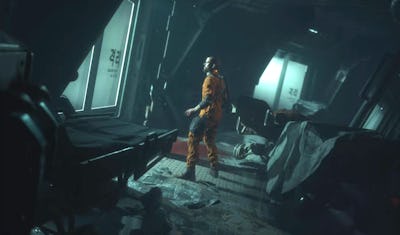 A character in Callisto Protocol looking out a window in an orange jumpsuit