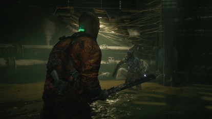 The player character in 'The Callisto Protocol' navigating through a dark corridor.