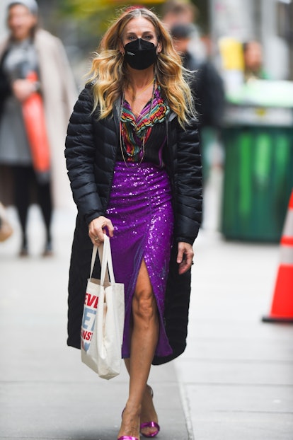 Sarah Jessica Parker wearing a purple sequin skirt.