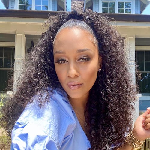 Tia Mowry outside sunny selfie