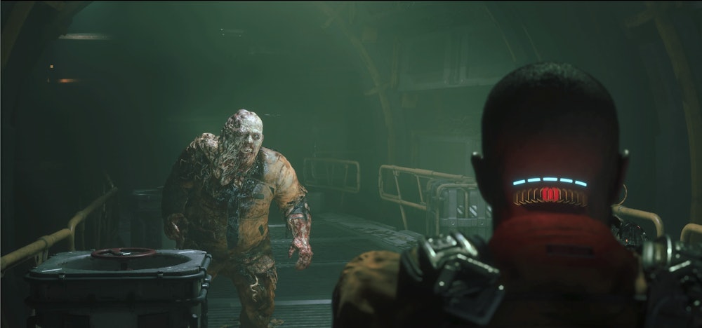 Screenshot of a humanoid enemy approaching the player character in 'The Callisto Protocol.'