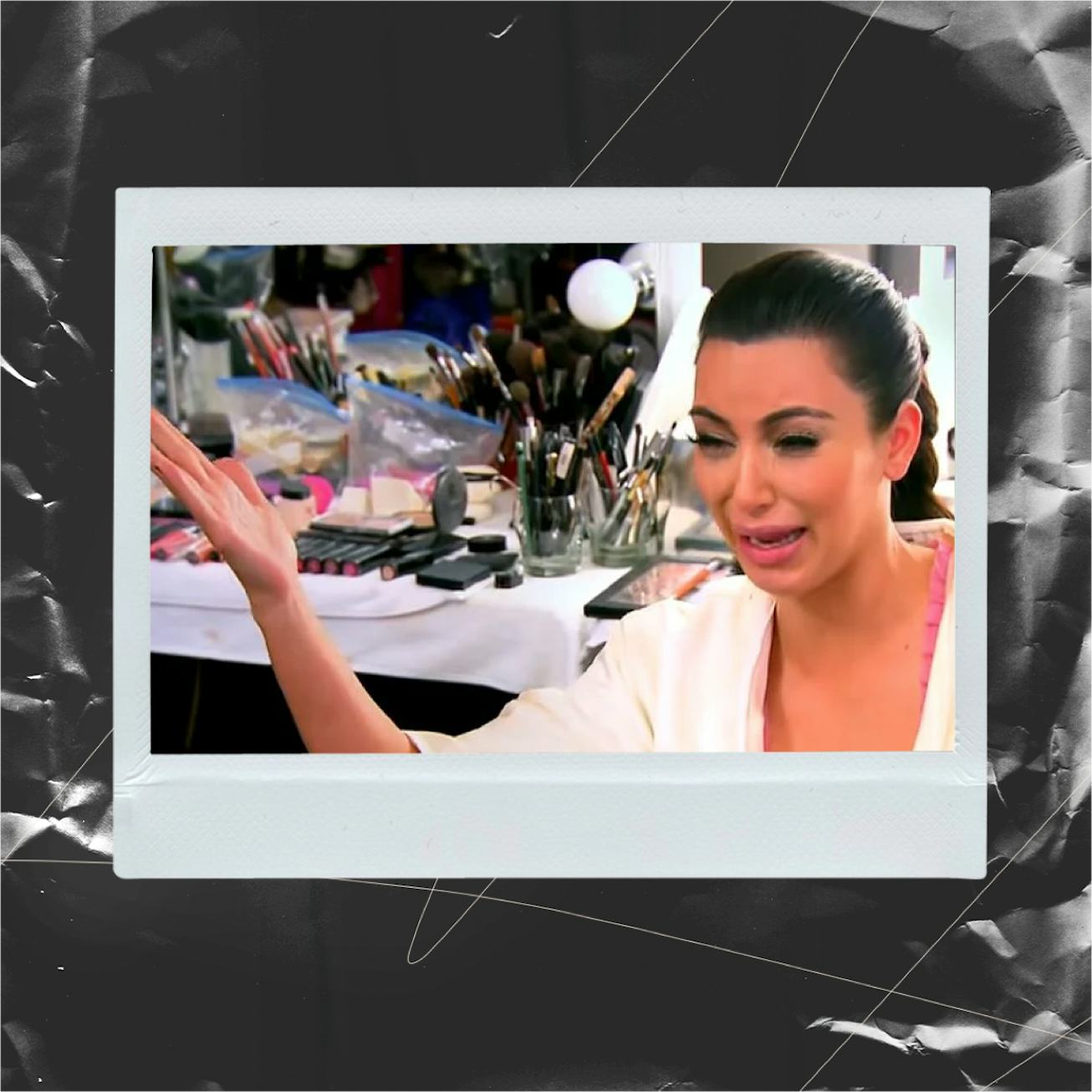 Media personality Kim Kardashian crying while the camera is filming