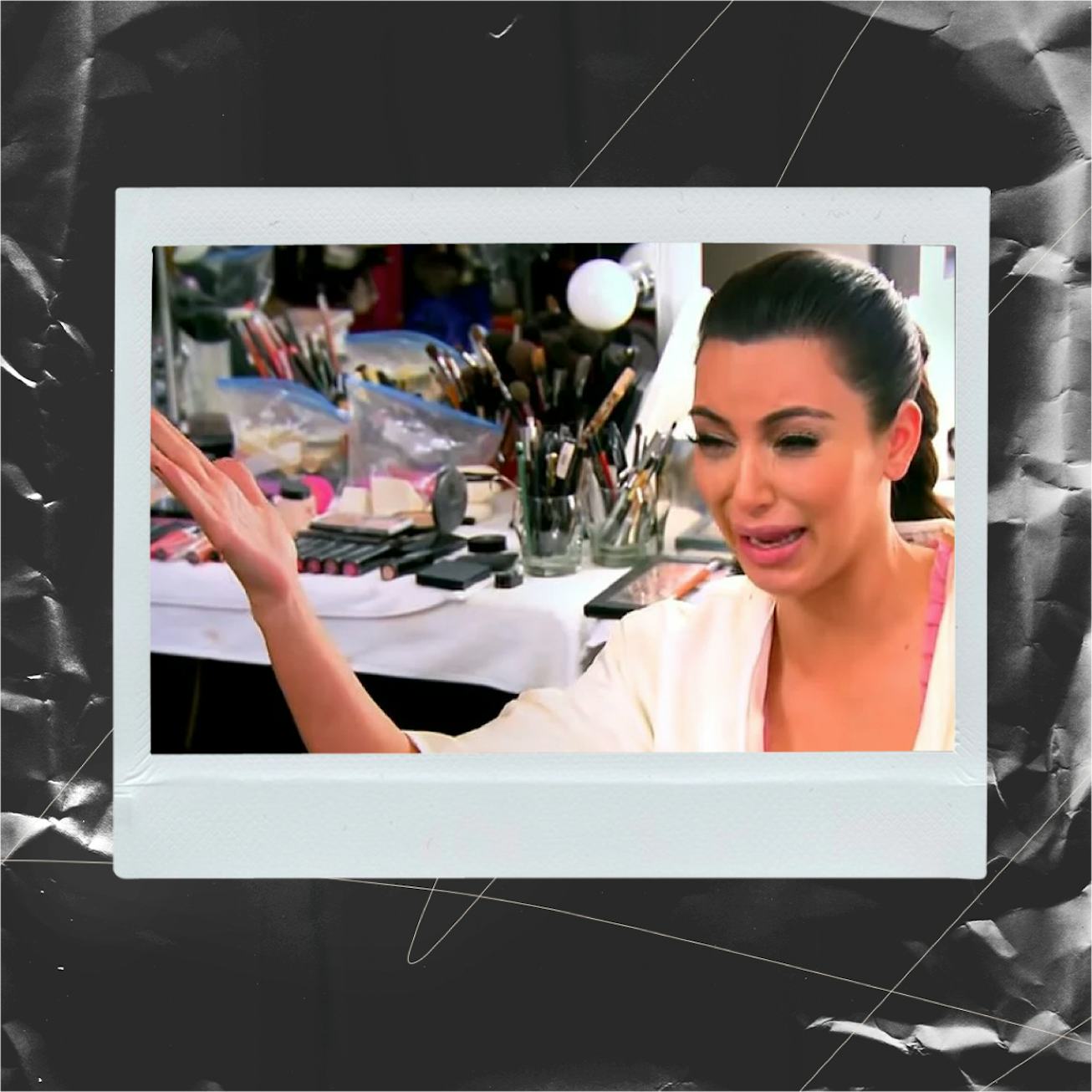 Media personality Kim Kardashian crying while the camera is filming 