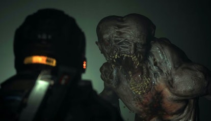 A deformed monster with two merged human faces staring at the player character.
