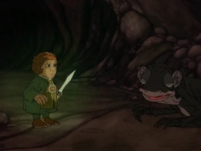 《霍比特人》中的比尔博(奥森·宾饰)和咕噜(西奥多·伊西多尔·戈特利布饰)。