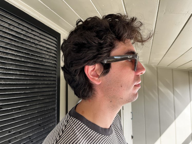 A side profile of Ian Carlos Campbell wearing the Ray-Ban Stories in black 