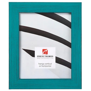 This teal picture frame is like Taylor Swift's "Anti-Hero" music video decor for your home.