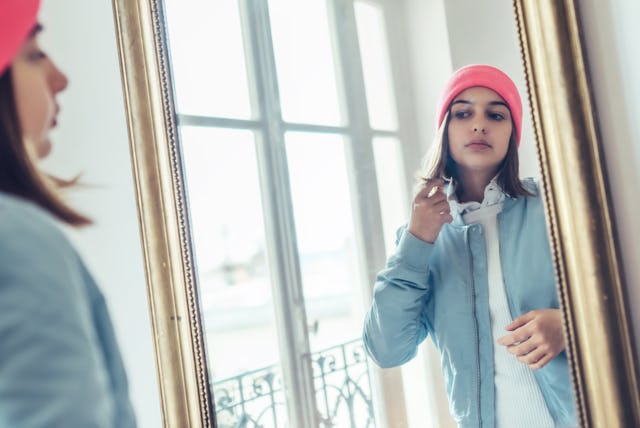 Body checking in teens, which may include studying their figure in the mirror, is a common symptom o...