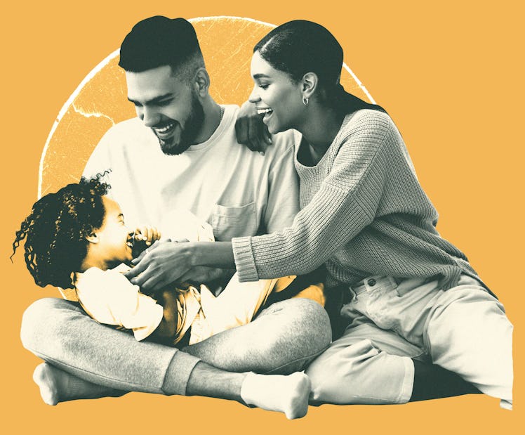 Latino father and Black mother playing with their son
