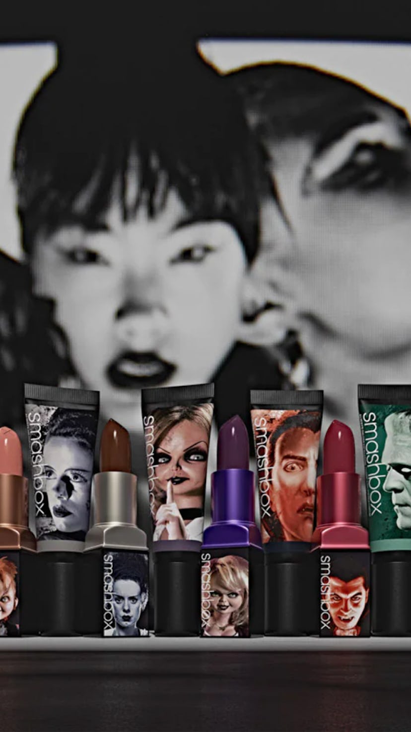 Cover of a catalogue with a model in black and white and four strong colored lipsticks in the focus