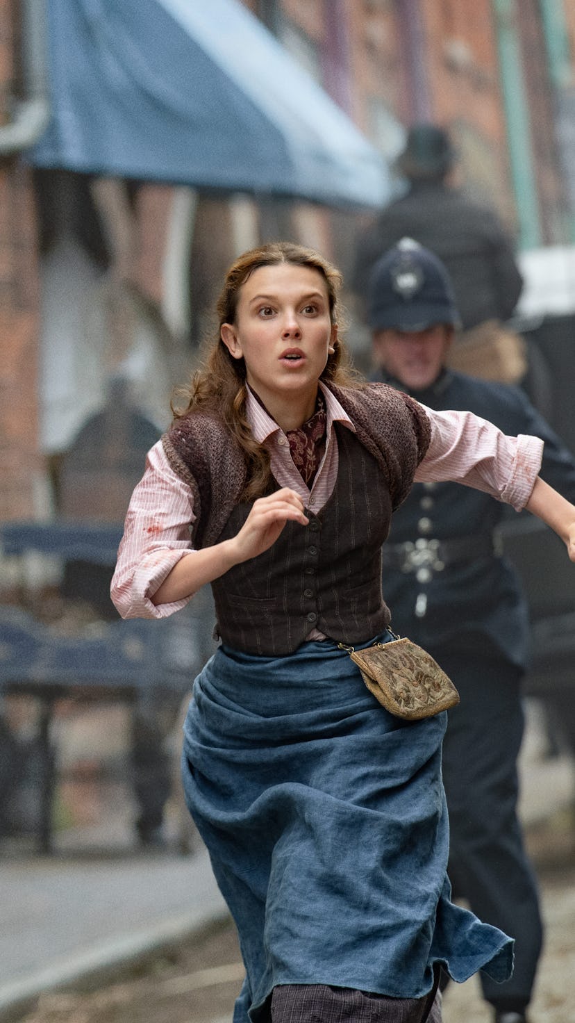 Millie Bobby Brown runs from the police in 'Enola Holmes 2'