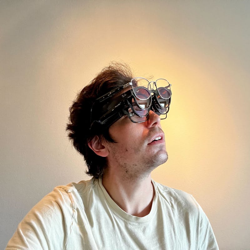 Ian wearing multiple pairs of smart glasses at once.