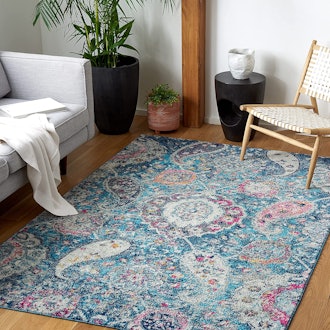 This stain-resistant rug under kitchen table features an oversize paisley pattern.