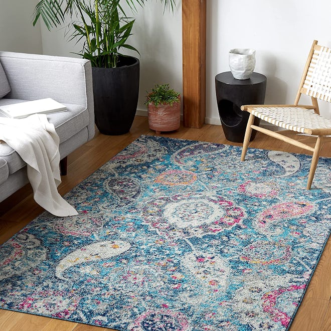 This stain-resistant rug under kitchen table features an oversize paisley pattern.