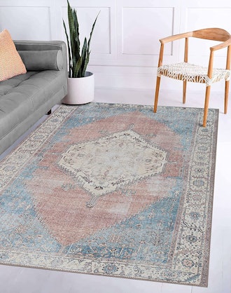 This machine-washable rug under kitchen table has a vintage, distressed look.