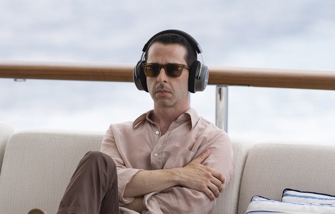 Man with headphones enjoying his favorite TV-show-related podcast