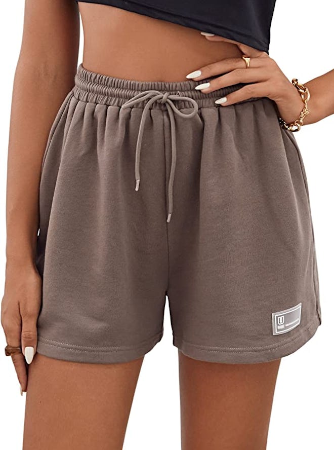 These sweat shorts feature a high waist and a looser fit.