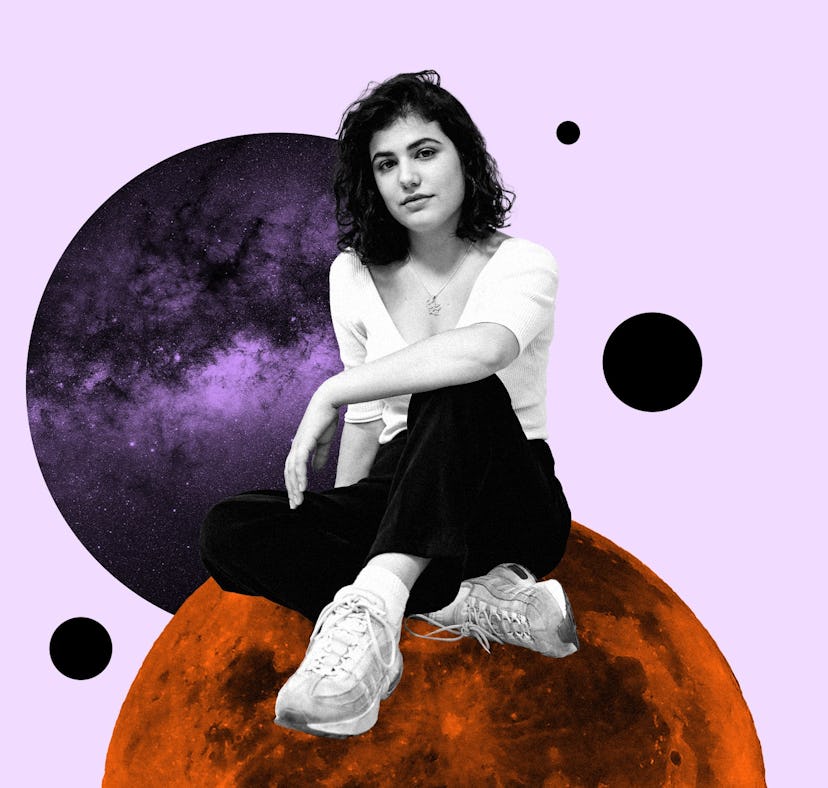Young woman sitting on a planet for your November 2022 monthly horoscope.