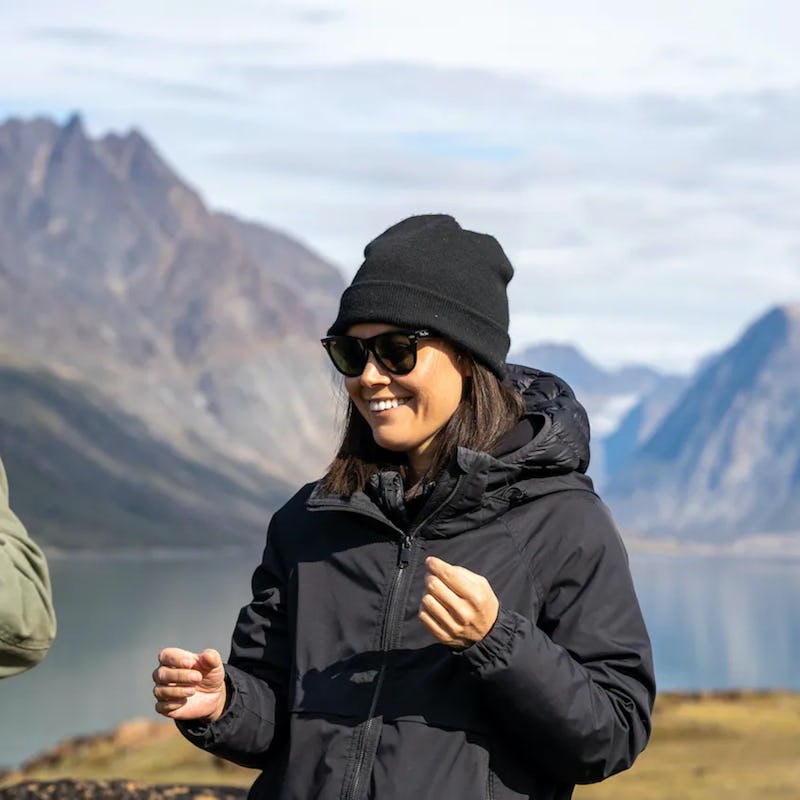 Younger woman smiling on the set of an upcoming sci-fi thriller on Arctic