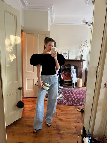 Laura Reilly wears relaxed wide leg pants as a fall denim trend. 