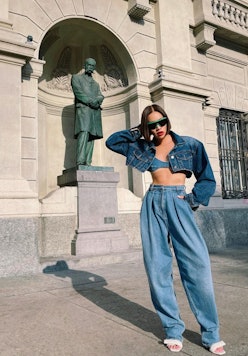 Tiffany Hsu wears a denim outfit at Milan Fashion Week 2022