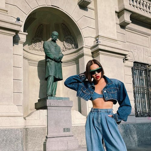 Tiffany Hsu wears a denim outfit at Milan Fashion Week 2022