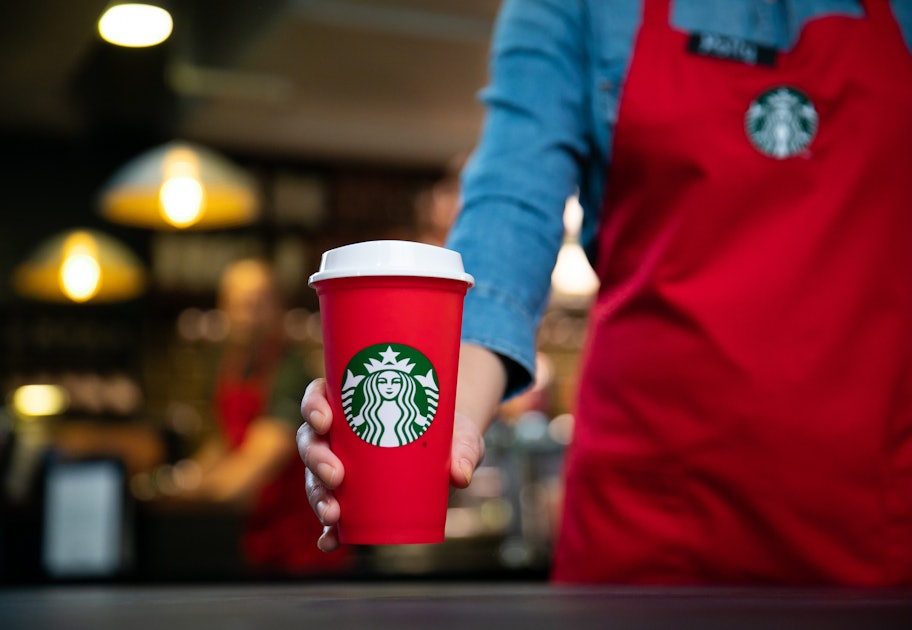 Starbucks holiday cups from previous years past on Red Cup Day