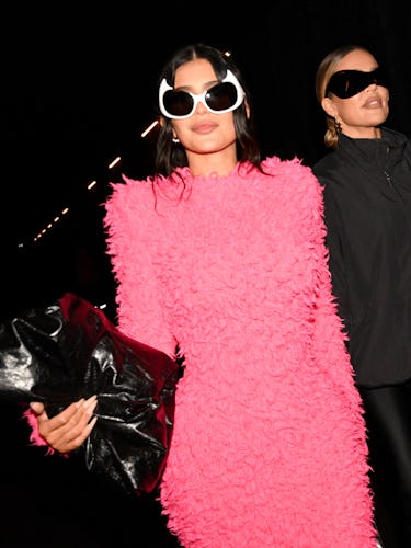 Kylie Jenner and Khloé Kardashian attend the Balenciaga Womenswear Spring/Summer 2023 show as part o...