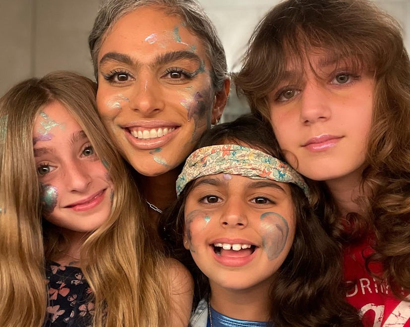 Two moms of color and their two daughters
