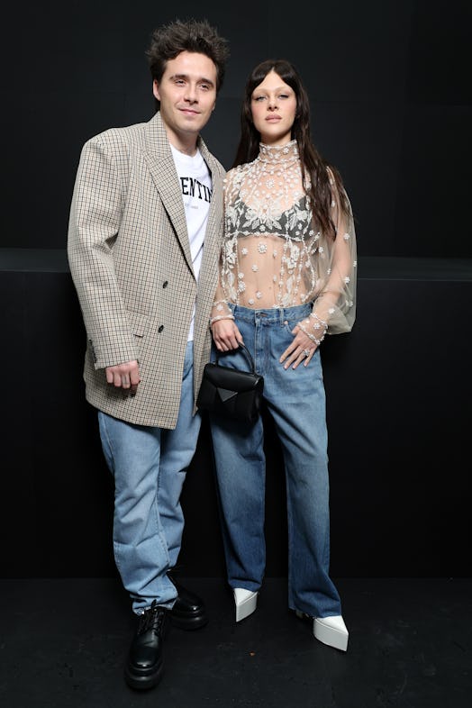 Brooklyn Beckham and Nicola Peltz Beckham attend the Valentino Womenswear Spring/Summer 2023 show as...