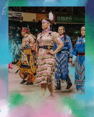 Midwife Rebekah Dunlap dancing in traditional regalia, a jingle dress