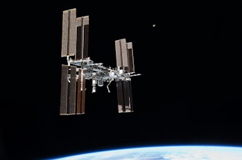 Color photo of International Space Station in orbit.
