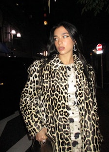 Dua Lipa wearing an animal printed coat
