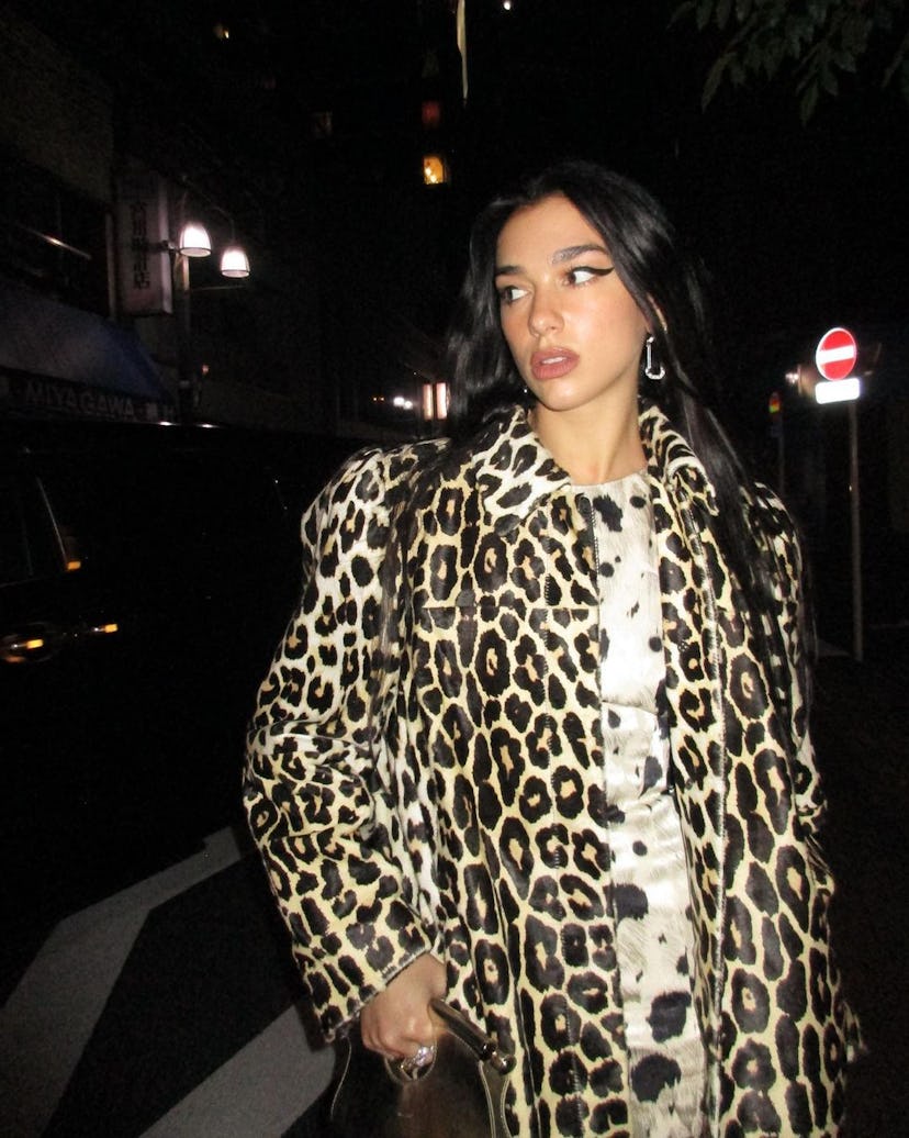 Dua Lipa wearing an animal printed coat