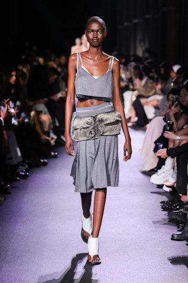  A model walks the runway during the Miu Miu Womenswear Spring/Summer 2023 show as part of Paris Fas...