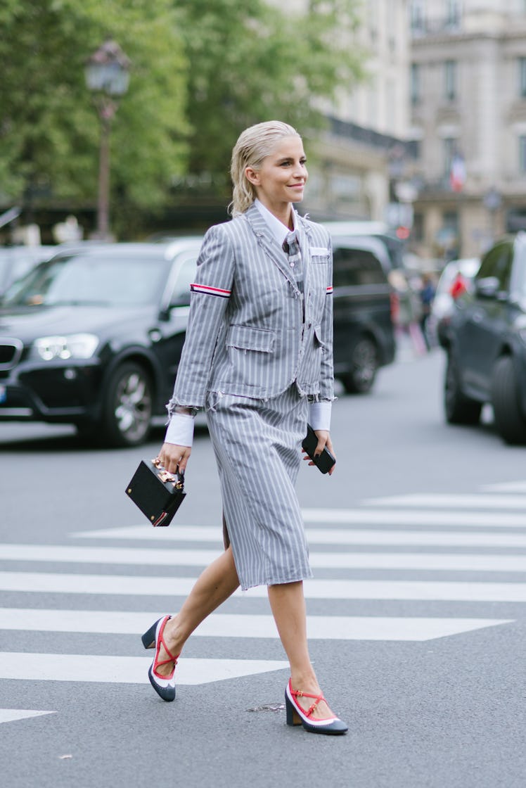 Caroline Daur poses wearing Thom Browne striped jacket and skirt after the Thom Browne show at the P...