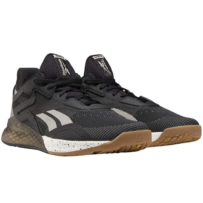 This pair of cross trainers for Orangetheory have a wide base for stability on the floor, rower, bik…