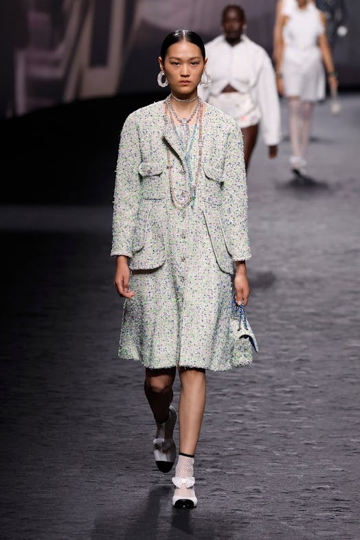 A model walks the runway during the Chanel Womenswear Spring/Summer 2023 show as part of Paris Fashi...