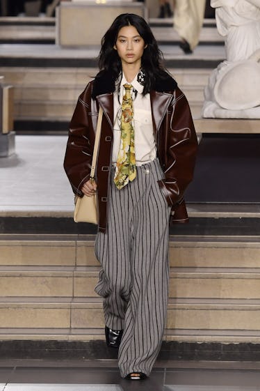 Milly Alcock Masters the ‘Cool Dad’ Look at the Louis Vuitton Show