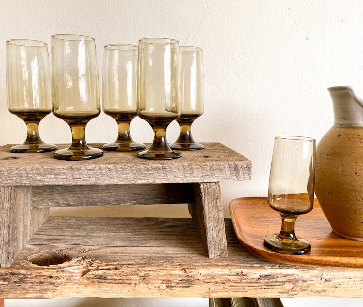 Vintage brown cordial glasses is a decor dupe inspired by Emma Chamberlains home design.