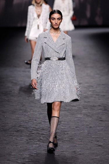 A model walks the runway during the Chanel Womenswear Spring/Summer 2023 show as part of Paris Fashi...